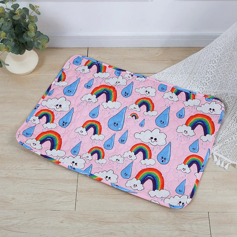 Reusable washable pet urine pad with colourful animal print and waterproof non-slip backing.