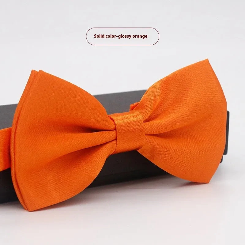 Men's solid colour formal bow tie in flat head style showing 12x6cm dimensions