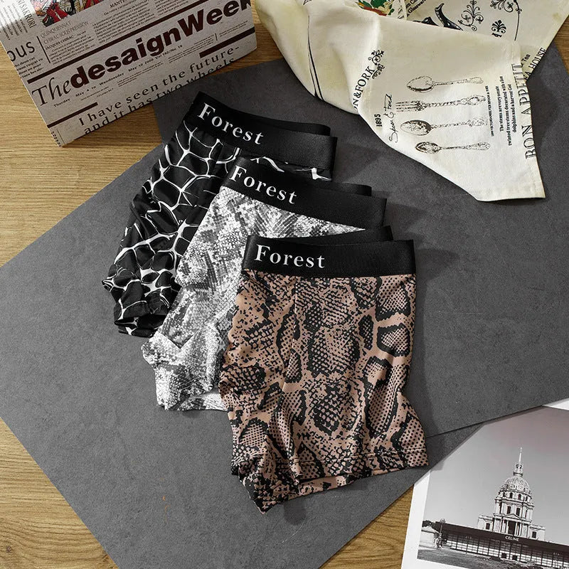 Men's thin polyester boxer shorts in black, grey, and brown with loose fit and mid-rise waist
