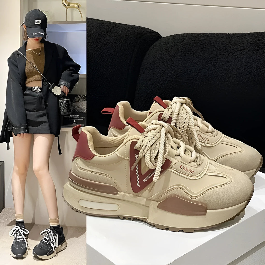 Women's black retro platform sports shoes with round toe and lace-up front on a rubber sole.