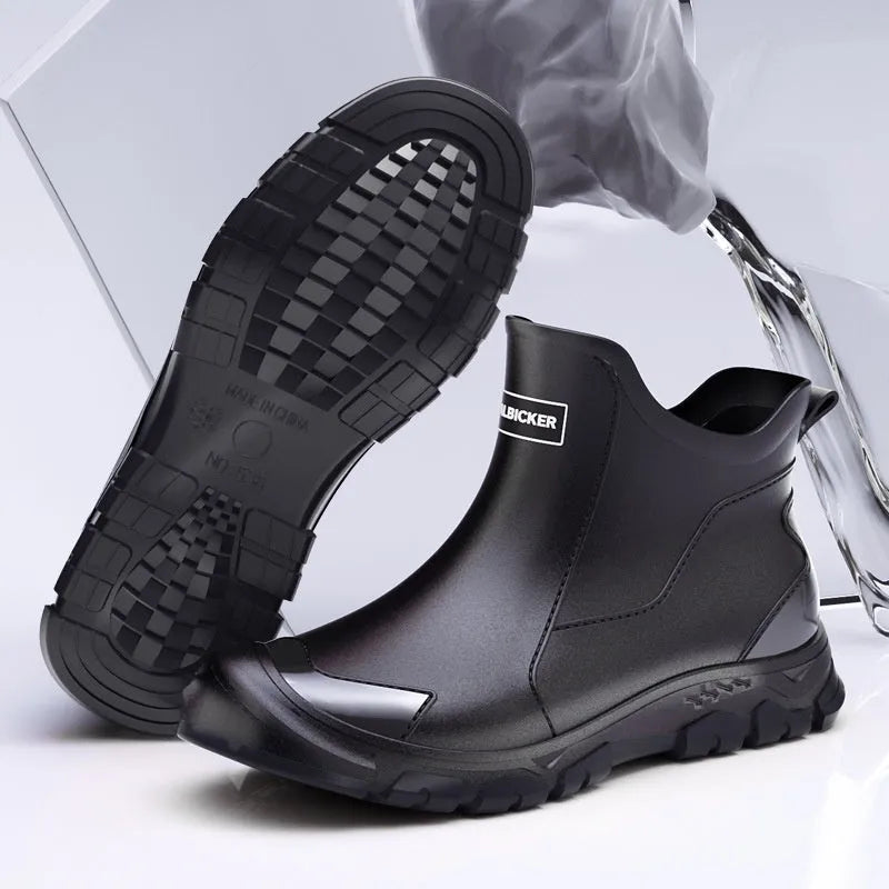 Short tube PVC wading shoe covers with round toe and non-slip plastic sole in solid colour.