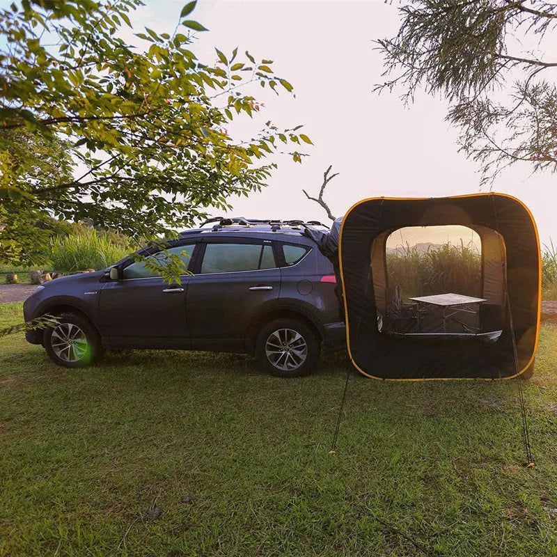Black pop-up car tailgate tent unfolded, showing quick-throw design and cubic 200cm dimensions.