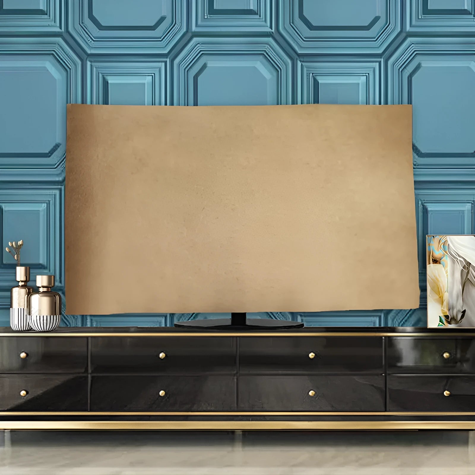 Pink velvet fabric cover draped over a large flat-screen television.