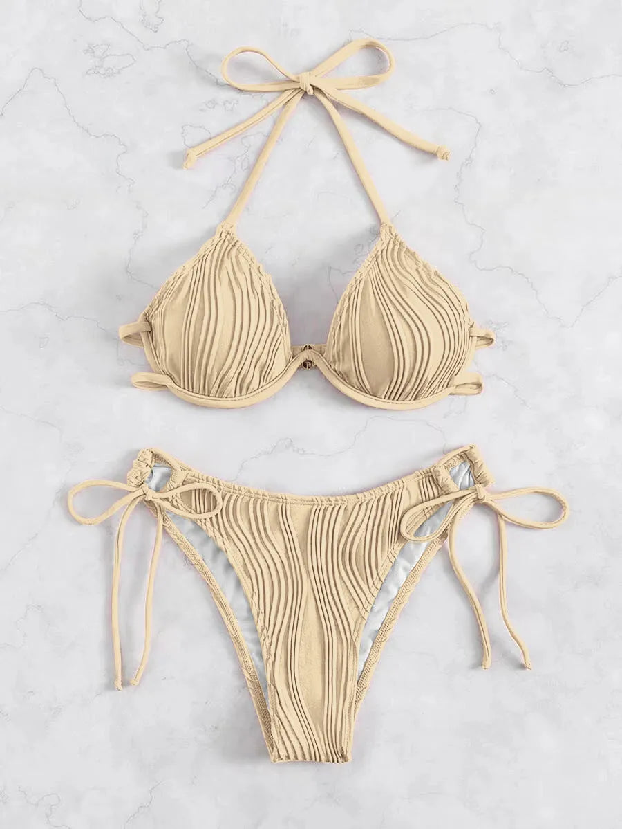 Women's apricot coloured split bikini swimsuit with steel wire bracket support.