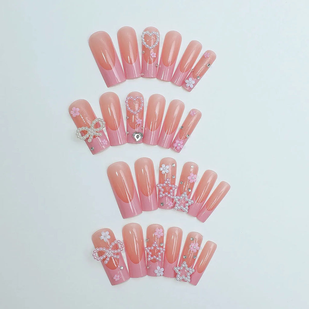 Super long pointed false nails with French spot drill bow design and love pattern in colour XB-70-48.