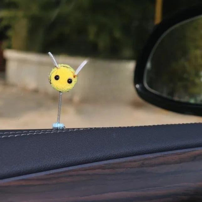 Yellow fur ball bee car decoration measuring 3cm square with cartoon design