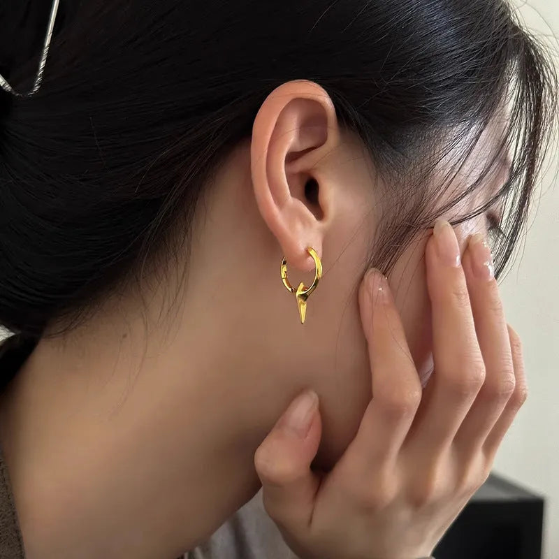Geometric star shaped ear clips for women with copper construction and platinum electroplated finish