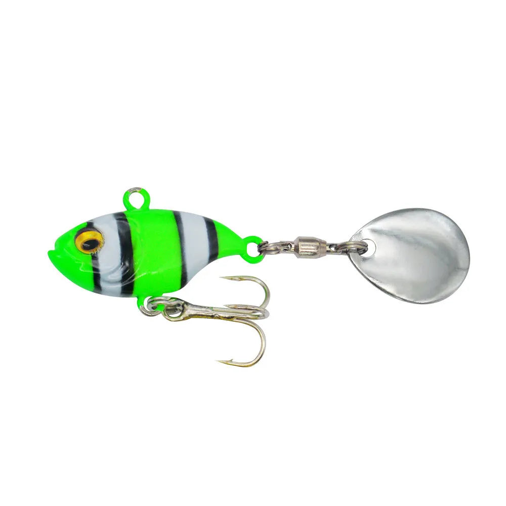 Metal sea fishing lure with rotating sequins in gold colour pattern