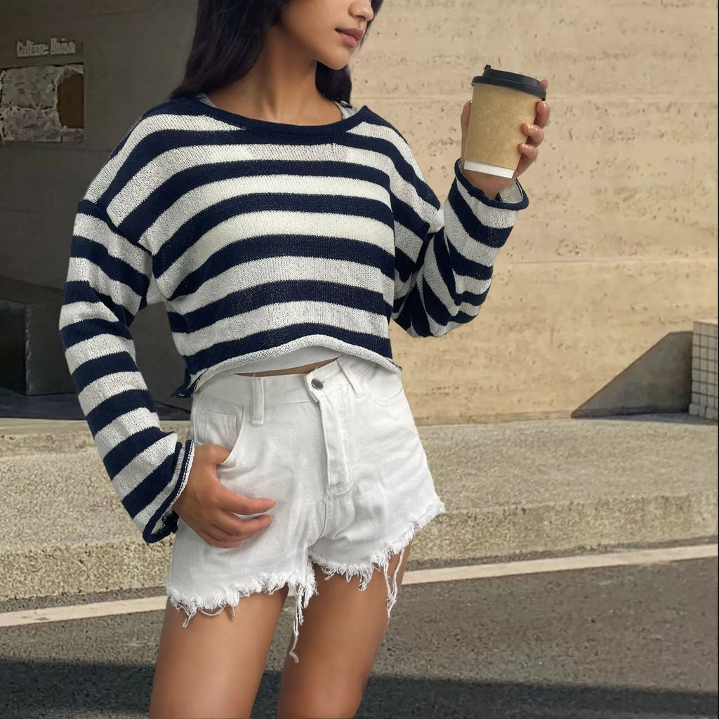 A woman's striped long-sleeve pullover sweater with a front and back wearable design in mercerised cotton.