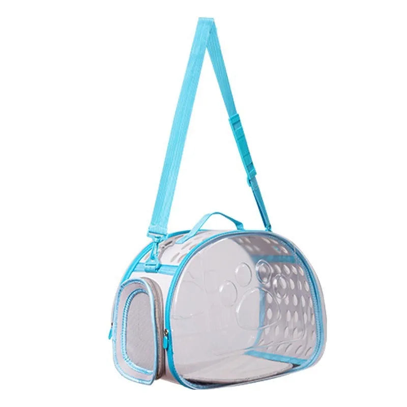 Transparent hard EVA space capsule backpack for cats, shown in green, with shoulder straps and large viewing window.