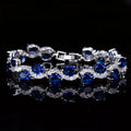 Copper gold plated bracelet with AAA+ zircon stones showing geometric design and 18.4 cm length
