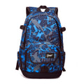 Blue or red nylon backpack with large 20-32 litre capacity for school, travel and outdoor use