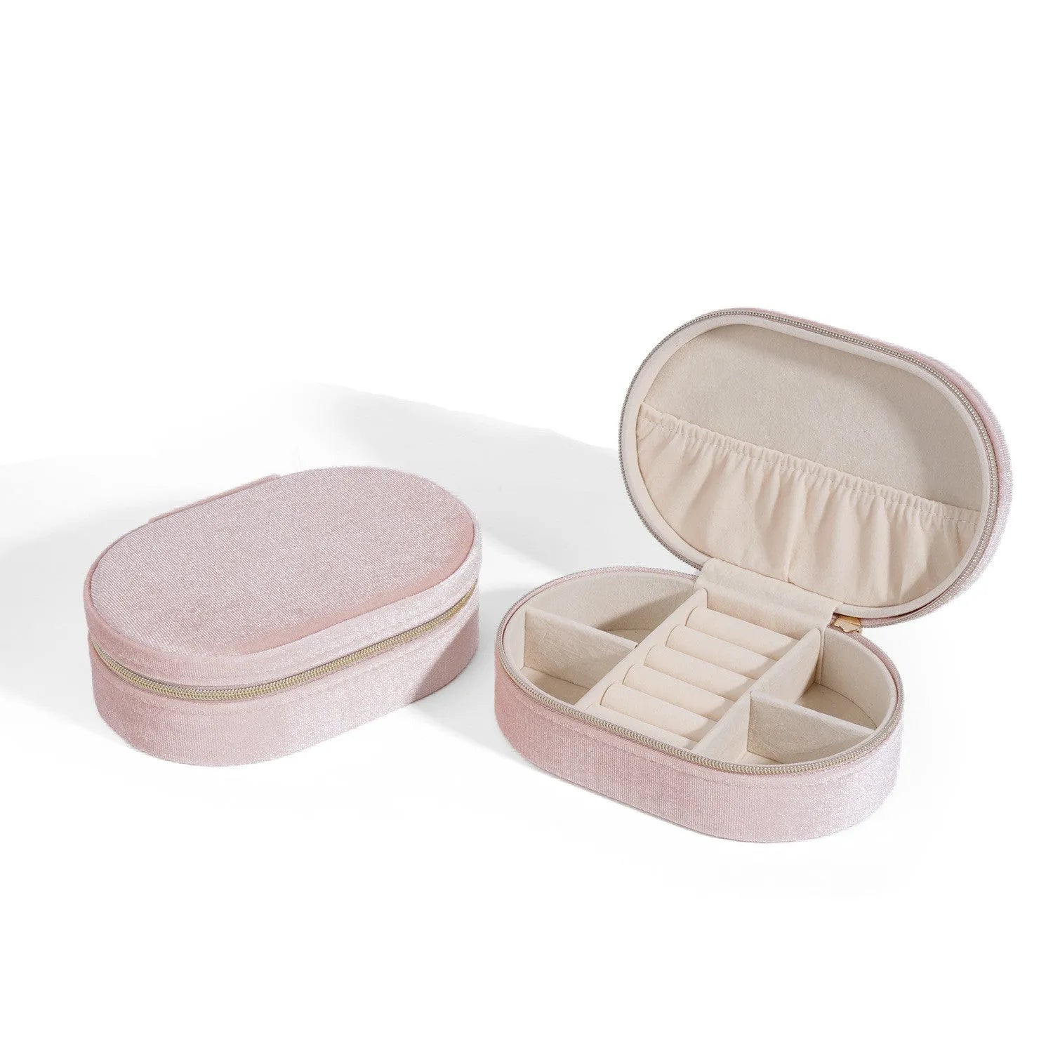 Oval velvet jewelry storage box in lake blue colour showing compact 15x10x5cm dimensions with flannel interior