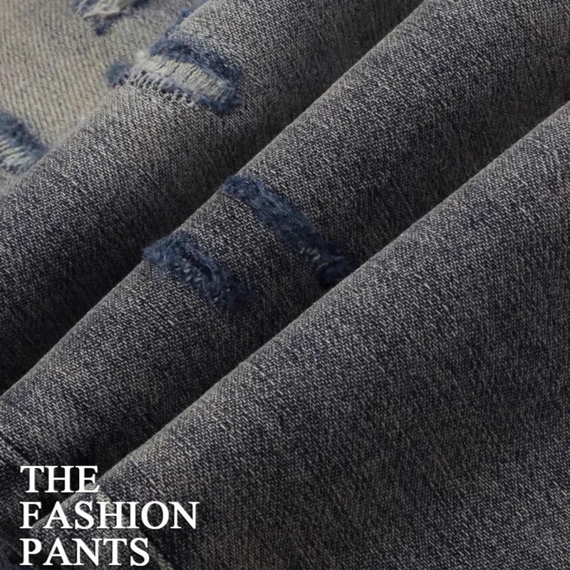 Mens old colour distressed patchwork skinny jeans with embroidery on a micro-elasticity cotton fabric.
