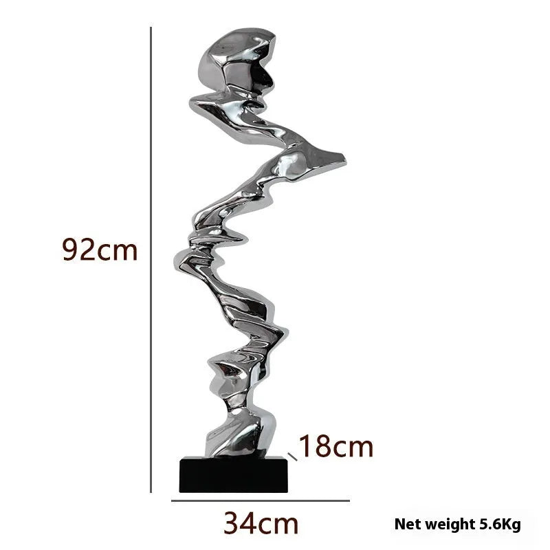 Modern minimalist abstract sculpture in natural resin, available in bright gold, elegant silver, or phantom blue.