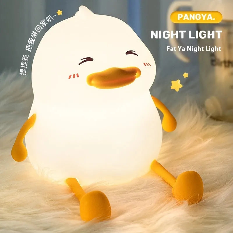 Chubby night light desk lamp with silicone phone holder in soft glow