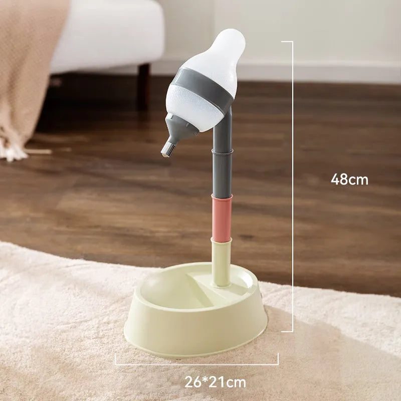 Green adjustable height pet water dispenser with detachable pole and bowl on a floor.