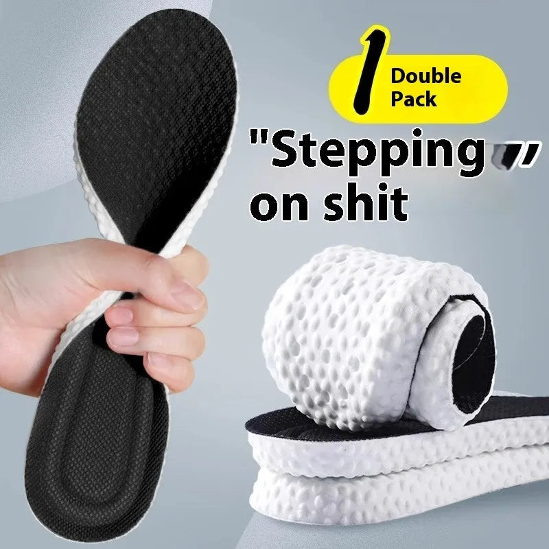 Grey, black, and orange PU foam sports insoles on a white background, showing trim-to-fit edges.