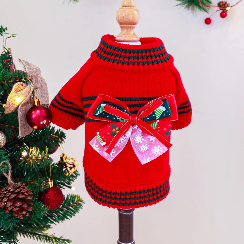 Red and green Merry Christmas dog jumpers for small to large pets on a festive background