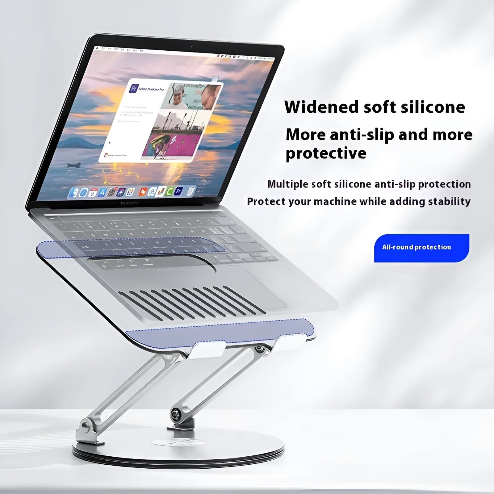 Silver aluminium laptop stand with rotatable base and height adjustment mechanism