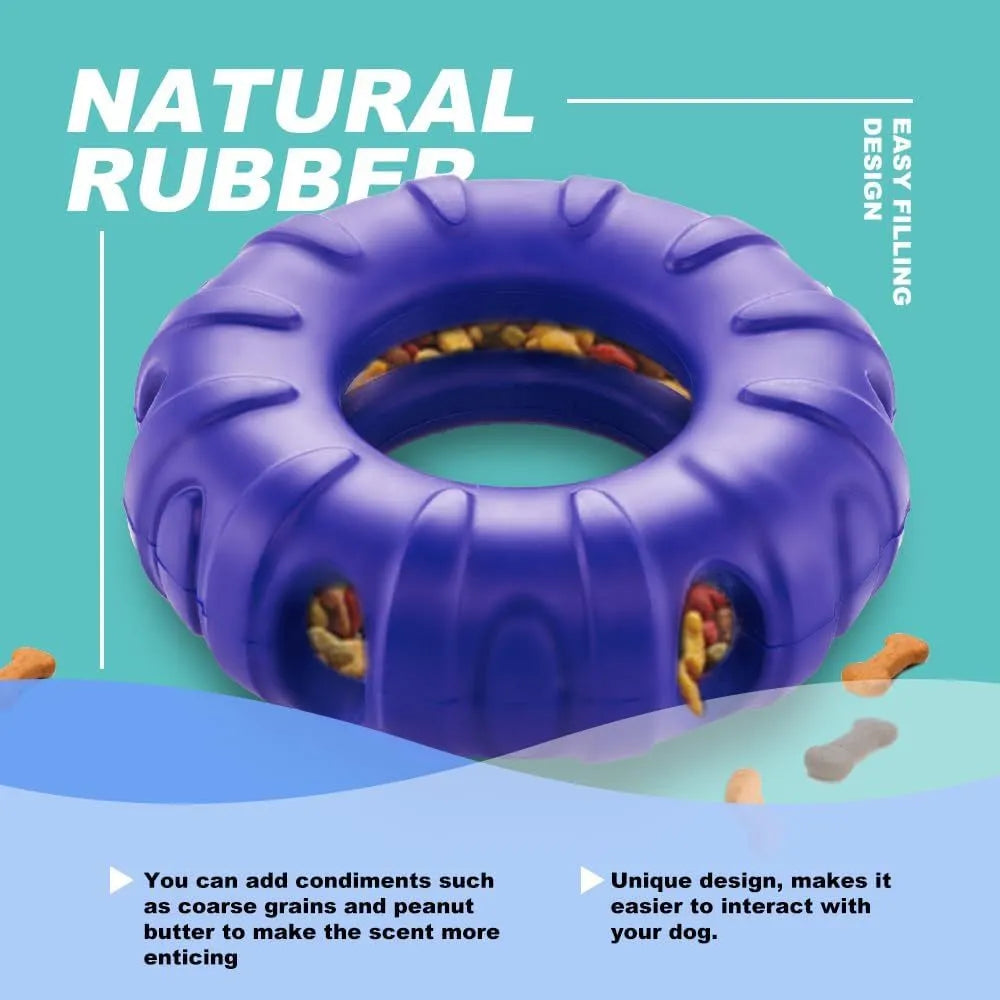 Blue natural rubber dog tyre chew toy with oval openings, shown as a slow feeder and interactive puzzle toy.