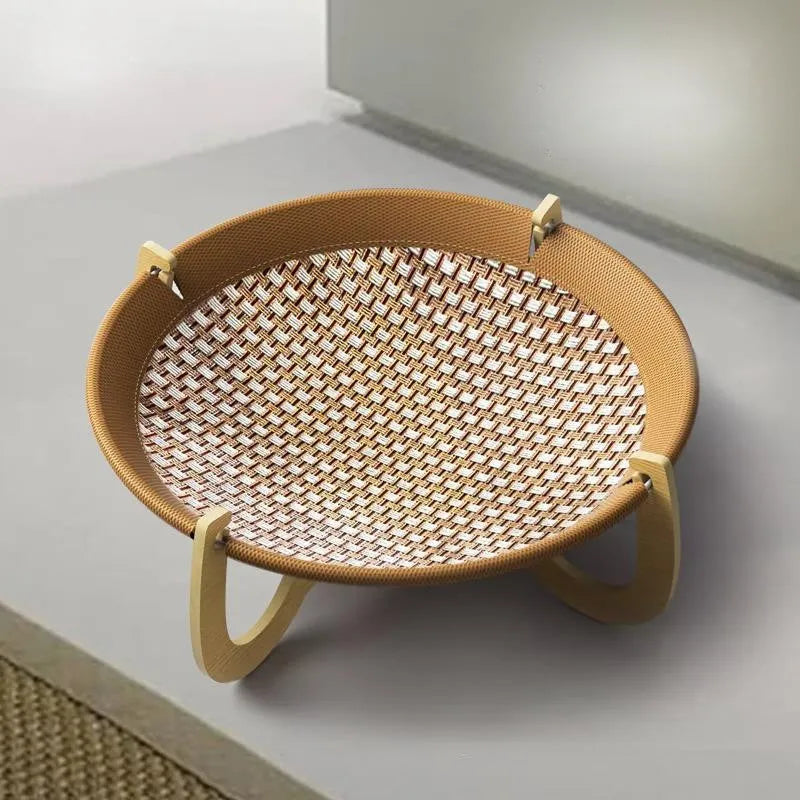 Brown woven rattan pet hammock bed measuring 46cm square raised off the ground