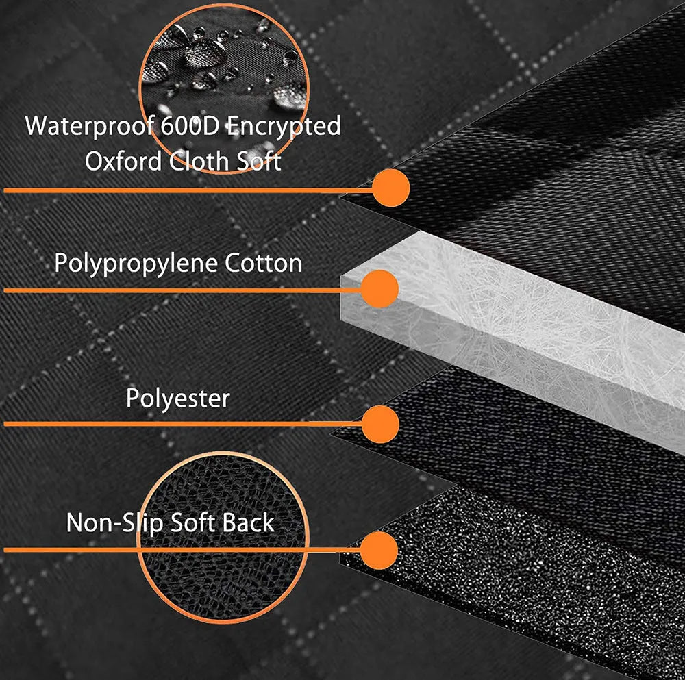 Black waterproof pet car seat cover with orange edge trim and mesh ventilation window laid on a rear car seat