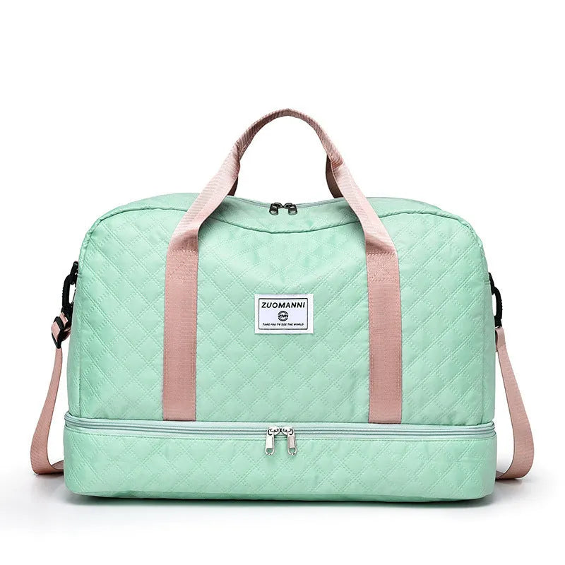 Oxford cloth travel bag with 36-55 litre capacity for leisure trips and buggy use in solid colour options