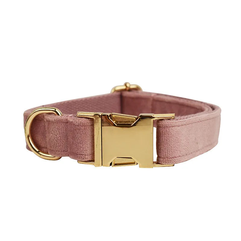 Light purple and pink velvet dog collar with matching leash and bow accessory set on a white background.