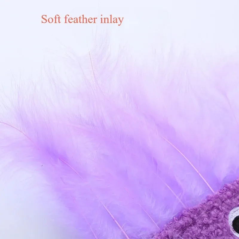 Colourful cat plush toy with a big mouth explosion head shape on a plain background.