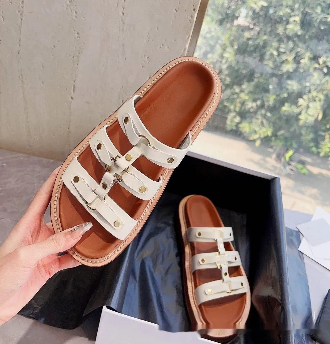 Women's brown retro Roman style sandal slippers with a sheepskin upper and patent leather finish.
