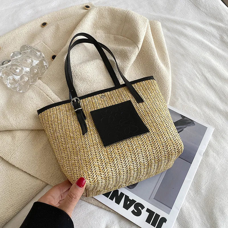Women's woven straw shoulder bag with square shape and large capacity in black colour