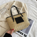 Women's woven straw shoulder bag with square shape and large capacity in black colour