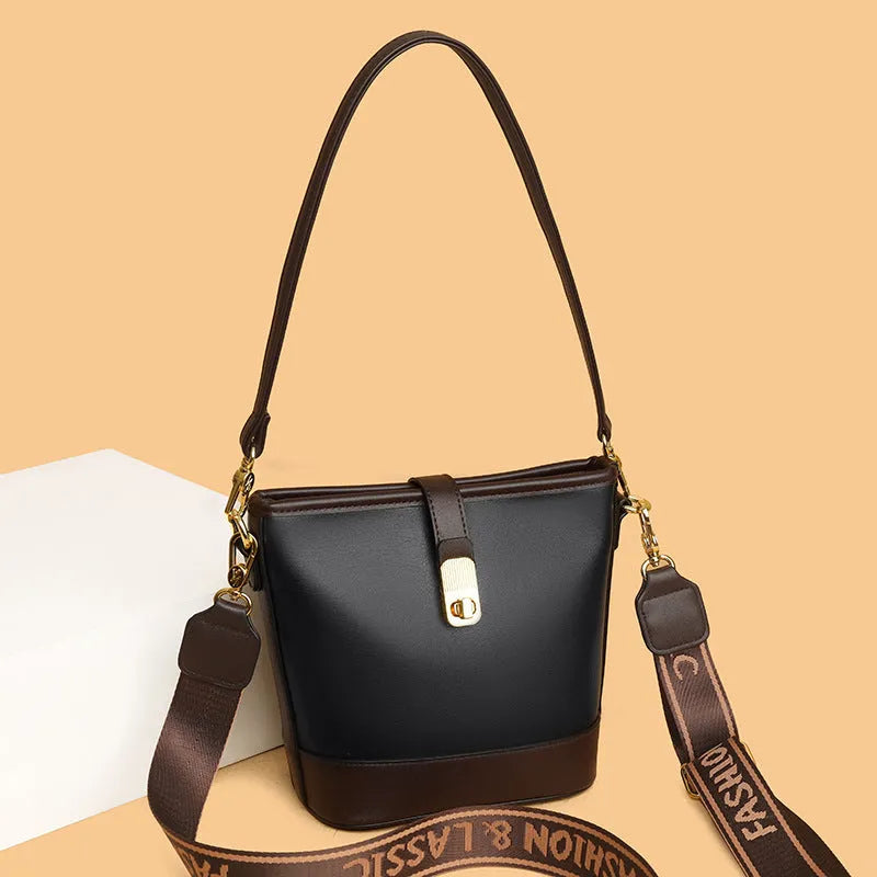 Korean style black soft PU bucket bag with double shoulder straps and multiple internal compartments