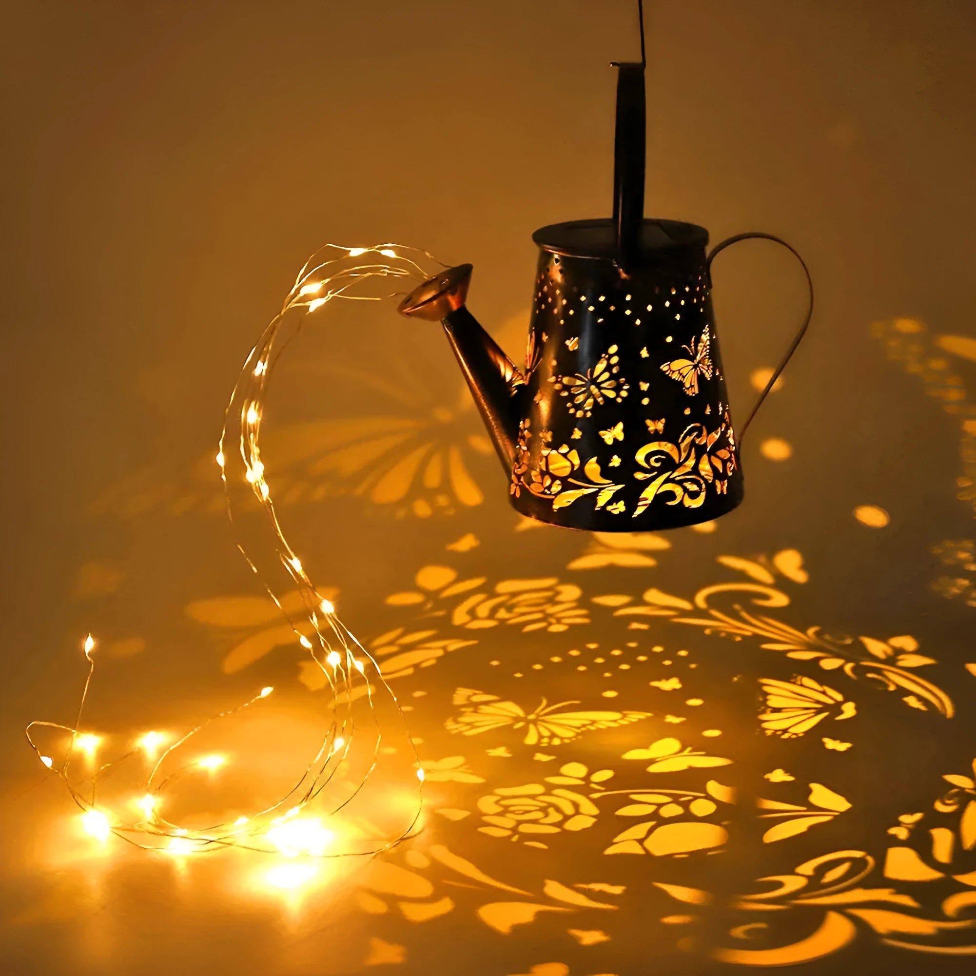 Solar garden lamp with tapered butterfly silhouette design in iron construction