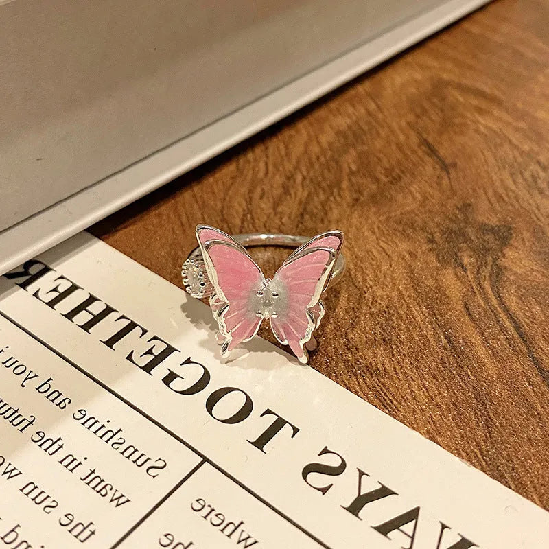 Creative Chinese butterfly women's copper ring with dripping oil treatment process in simple style.