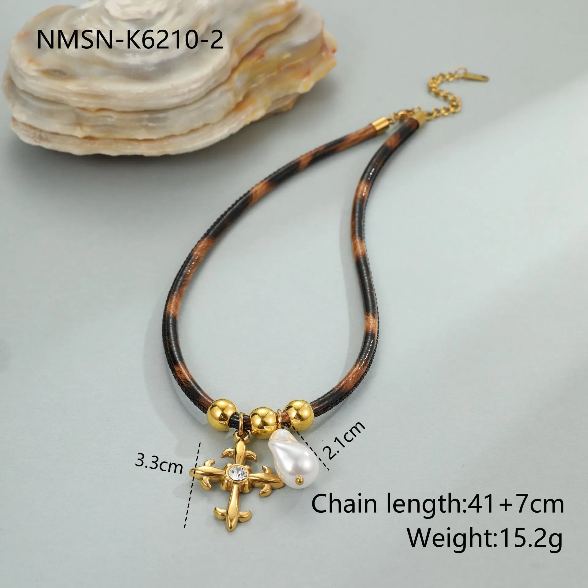 Geometric leopard pendant necklace on stainless steel chain with gold electroplated finish
