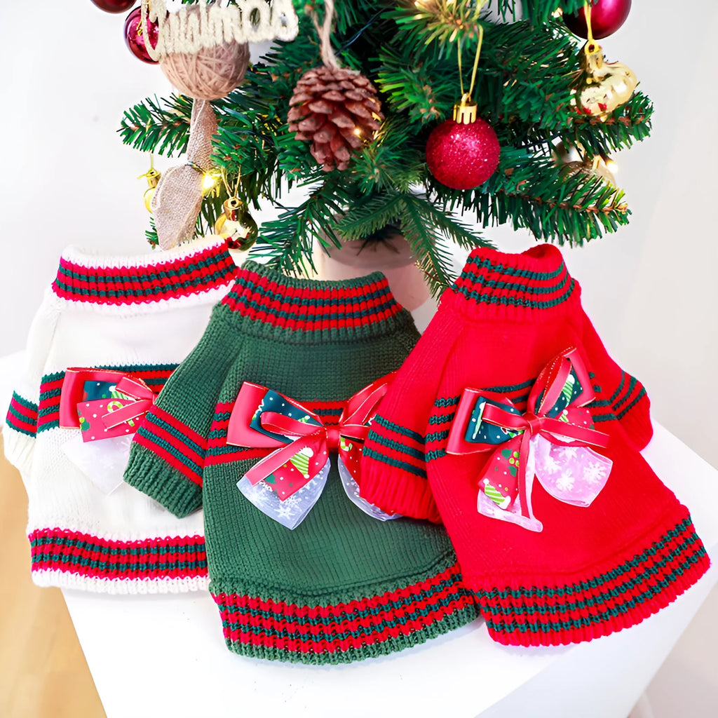 Red and green Merry Christmas dog jumpers for small to large pets on a festive background