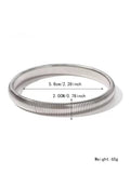Gold titanium steel women's bracelet with elastic band and vertical stripe ring pattern, shown at 2cm width.