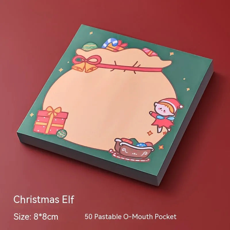 Christmas sticky notes book showing cartoon designs of Elf, Gift, Sled, Ball, Santa, House, Bear, and Snowman