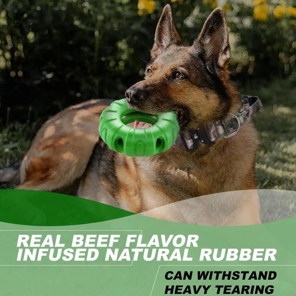 Blue natural rubber dog tyre chew toy with oval openings, shown as a slow feeder and interactive puzzle toy.