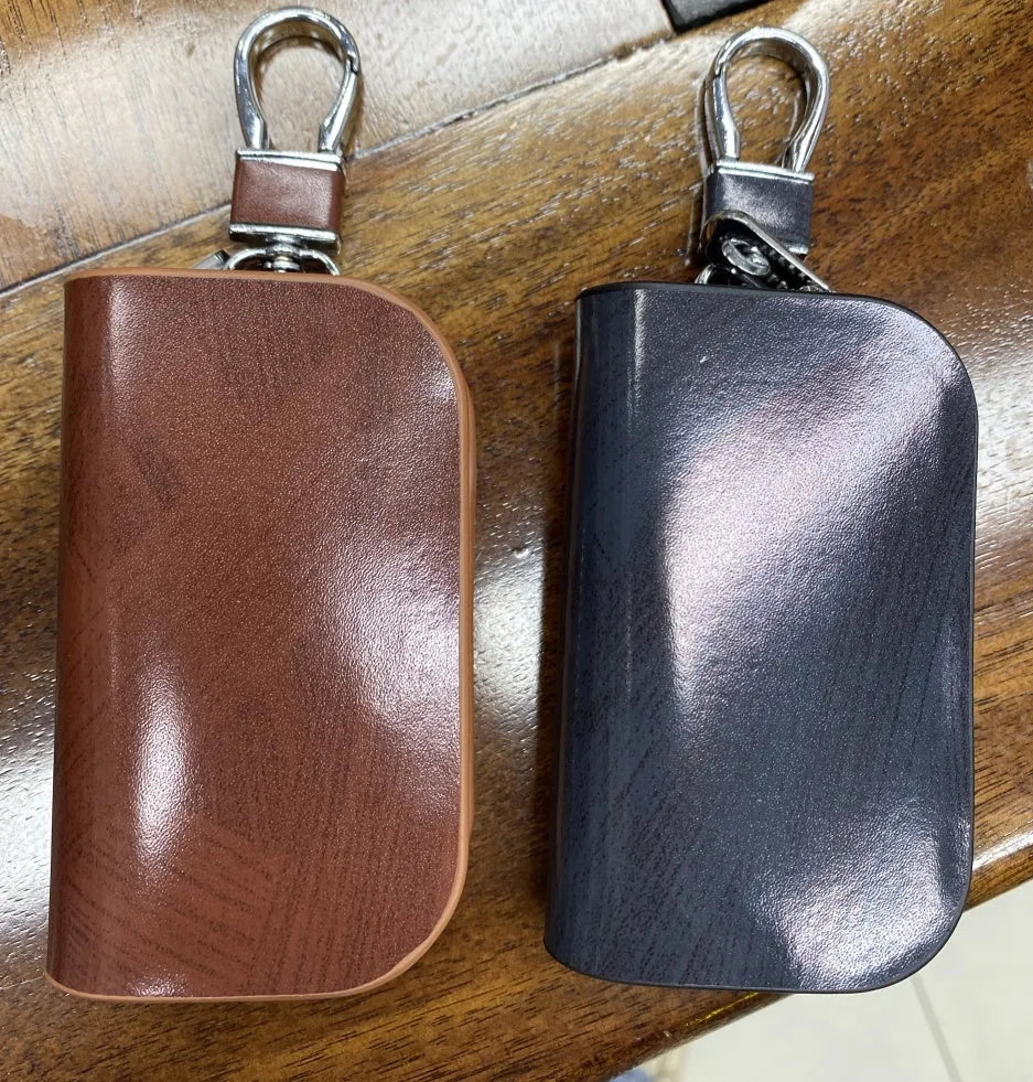 Genuine V-grain cowhide leather car key case in black or brown colour with frosted finish