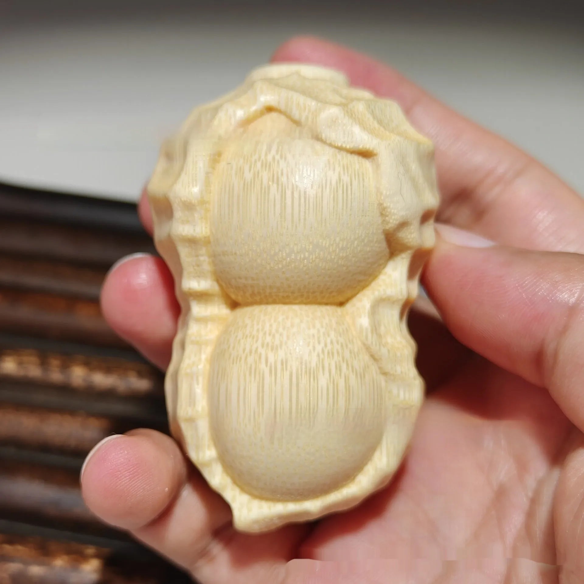 Solid bamboo peanut ornament carving with May Good Things Happen message