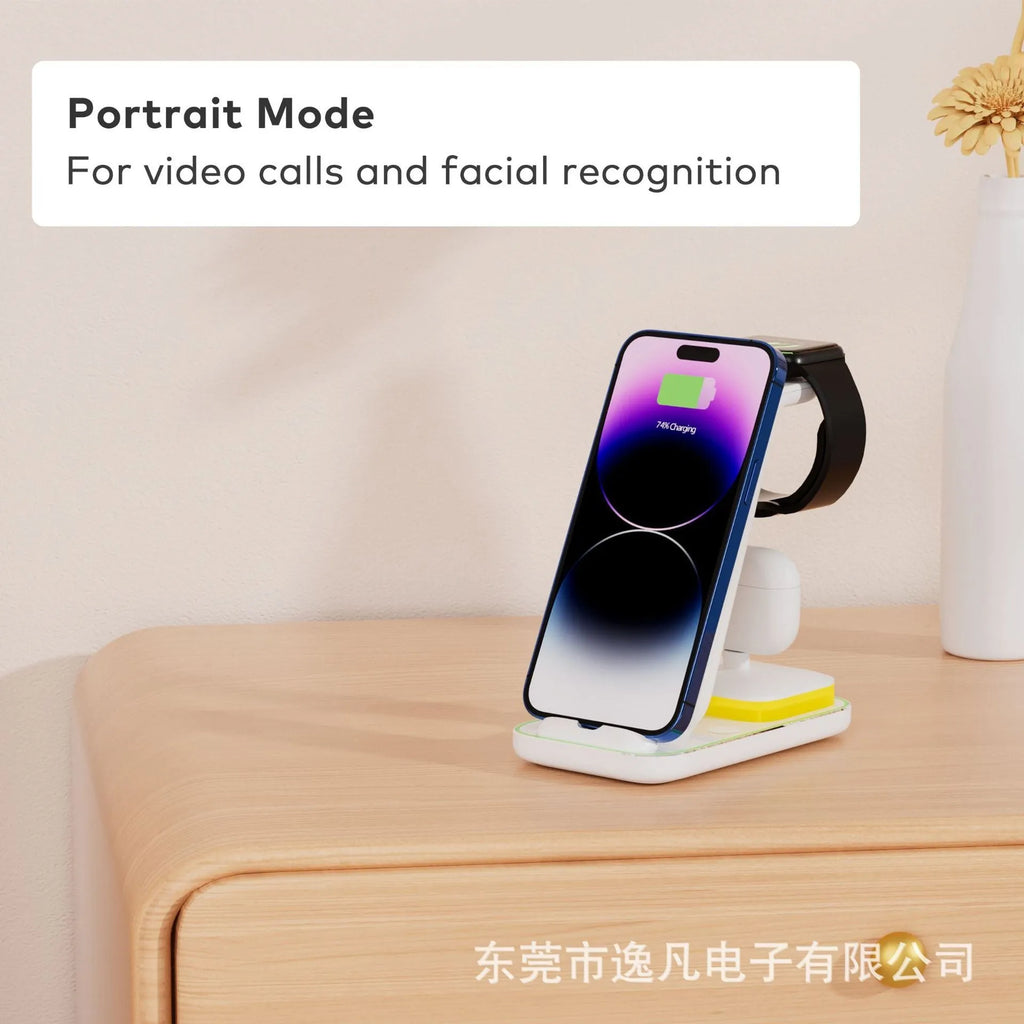 Black vertical wireless charging station with phone, smartwatch, and headphones charging simultaneously.