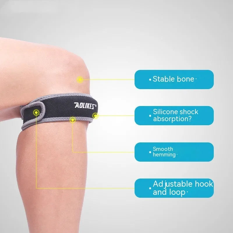Black and grey adult patellar retinaculum knee brace for sports support.