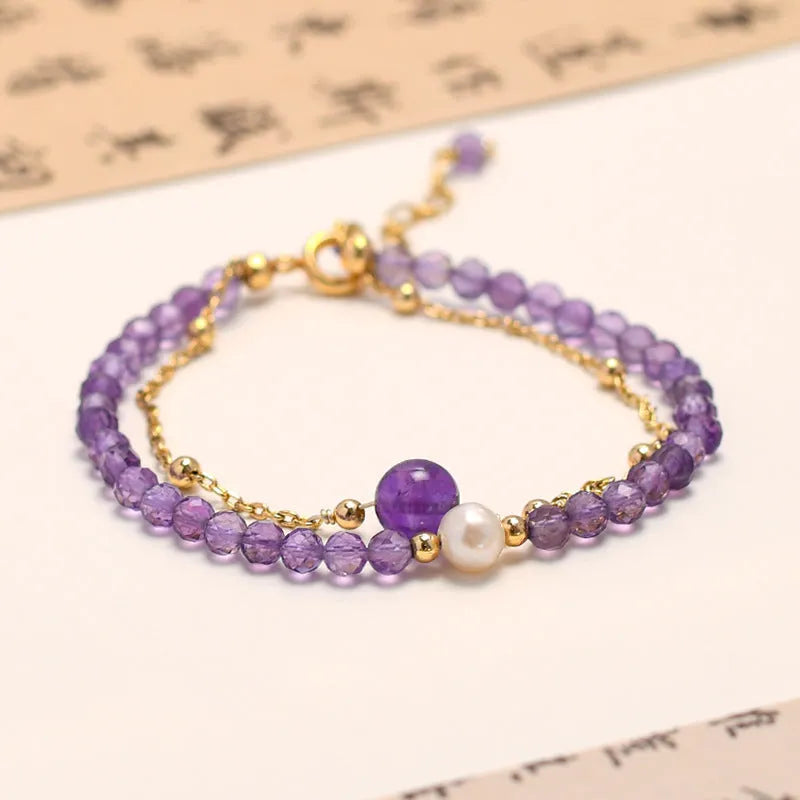 Women's amethyst Chinese style crystal bracelet with diamond-shaped beads and electroplated metal.