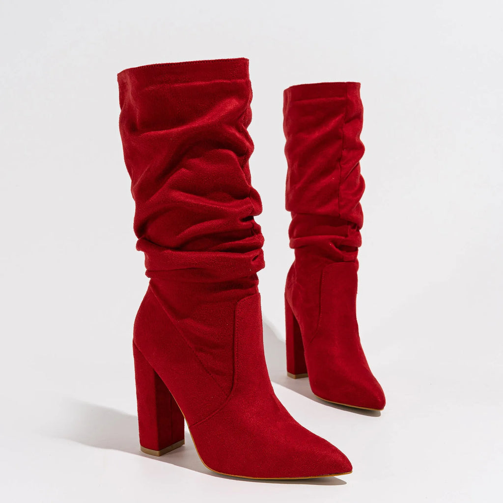 Women's black suede chunky heel pointed toe boots with super high heels and mid-calf length
