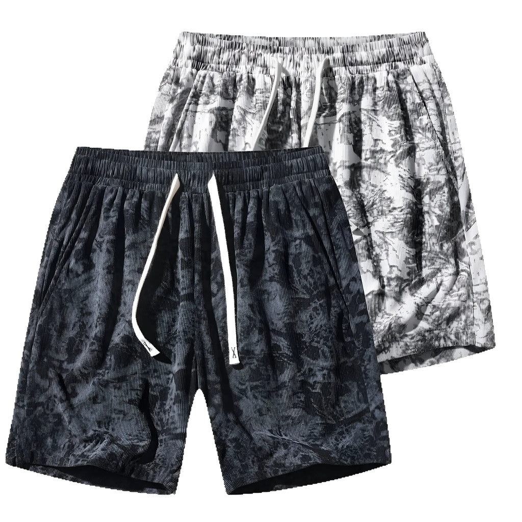 Men's camouflage pattern corduroy shorts with an elasticated high waistband on a plain background.