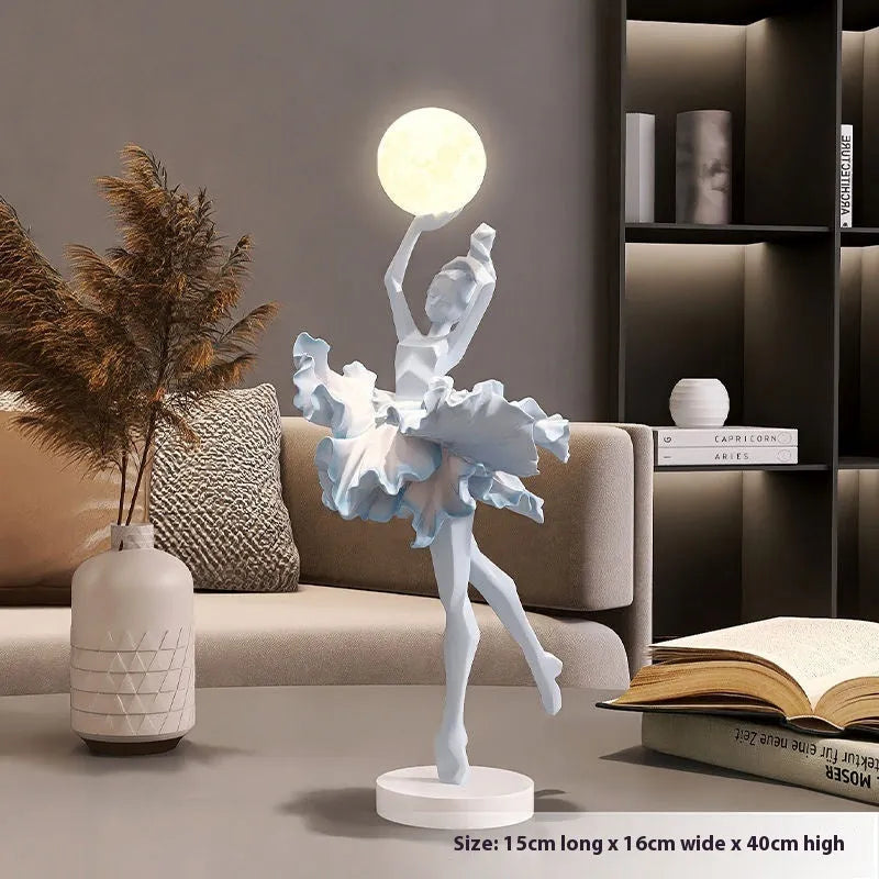 Art Girl Atmosphere small resin night light in Black Gold colour with USB charging cable.