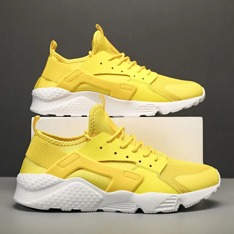 Men's low top casual shoes with cross strap design and mesh construction in fluorescent colours
